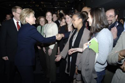 Photo: U.S. Secretary of State Hillary R. Clinton shakes hands with employees during her visit to USAID headquarters.  Credit: John Burnes, USAID -- Click for high-resolution image