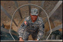 Army Brig. Gen. Rafael O’Ferrall, Joint Task Force Guantanamo deputy commander, climbs down the ladder