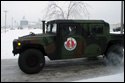 Vehicles from the 205th Military Police Battalion and the 1137th Military Police Company of the Missouri National Guard head out to help communities