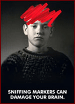 Image of male teen with red permanent maker over his head.  Sniffing markers can damage your brain.