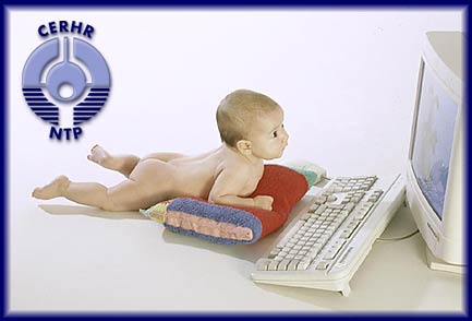 picture of baby in front of a computer