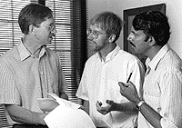 Drs. William Knowler, Robert Hansen, and Venkat Narayan discussing research results.