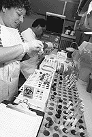 Scientists conducting clinical studies in a laboratory.