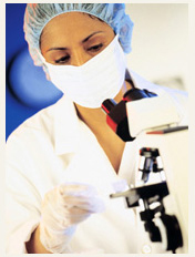 Female health care professional working in a laboratory.