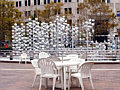 Tables in a gathering area outside the Bethesda Metro Center