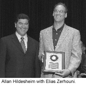 Allan Hildesheim with Elias Zerhouni.