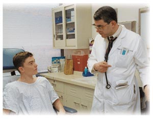 Photo of a doctor talking to a patient