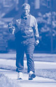 Image of an elderly man is walking.