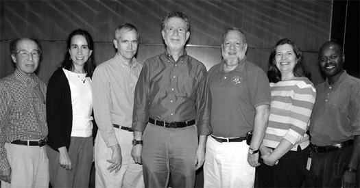 A photograph of the Individual Merit Winners: Kiyohiko Mabuchi, Rachael Stolzenberg-Solomon, William Anderson, Arthur Schatzkin, Mark Greene, Kristin Kiser, and Sam Mbulaiteye. (Not shown: Mark Sherman.).