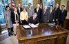 President Bush Signs H.R. 493