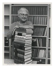 [Virginia Apgar with stack of books on neonatal medicine]. [ca. 1970].