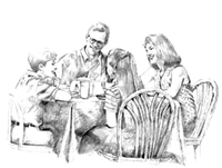 Familia reunida en mesa de comer