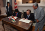 a photo of NIH Director Dr. Elias A. Zerhouni and Dr. Maharaj K. Bhan signing the Statement of Intent