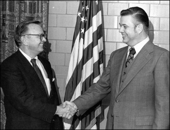 Photograph of Dr. Richard Krause (then NIAID director) and Dr. Kenneth Sell (NIAID's scientific director) collaborated to find the resources to further AIDS research.