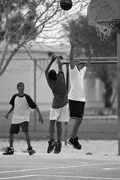 Photo of boys playing basketball