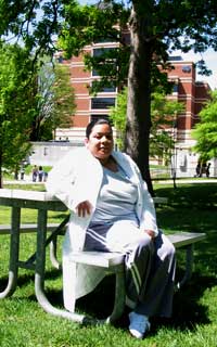 Maritza enjoys relaxing at the picnic tables outside the Clinical Center when she has a rare break or to eat lunch with colleagues.