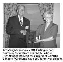 Jim Vaught receives 2004 Distinguished Alumnus Award from Elizabeth Leibach, President of the Medical College of Georgia School of Graduate Studies Alumni Association