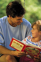 father and daughter reading