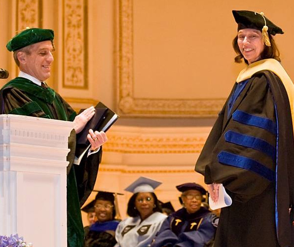 NINR director Dr. Patricia Grady receives an honorary doctor of science degree recently from Dr. John C. LaRosa, president of SUNY Downstate Medical Center.