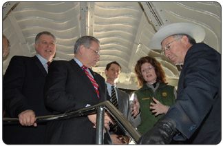 Secretary of the Interior Ken Salazar pledges to work hard with the National Park Service to explore all feasible alternatives to reopen the crown of the Statue of Liberty. NPS Superintendent Cynthia Garrett explains safety concerns regarding access to crown to Secretary Salazar, at right, who was accompanied by U.S. Sen. Robert Menendez; and U.S. Reps. Anthony D, Weiner (NY) and Albio Sires (NJ). [Photo Credit: Tami Heilemann, DOI-NBC]  