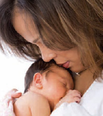 Photo of a Mother holding a Baby