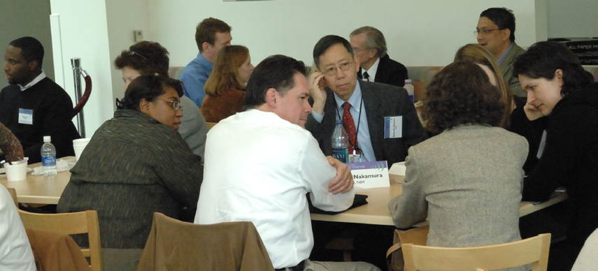 NIMH deputy director Dr. Richard Nakamura (c) hosts one of 9 informal lunch roundtables during the retreat segment “Conversations with Senior Staff.”