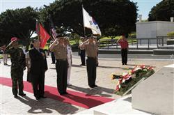 HONOLULU-Lt. Gen. Lee Hong Hee (front, center), commandant of the Republic of Korea Marine Corps, Alan Sumitomo (left), cemetery support and Lt. Col. Ahn Byong-Hyun (right) render a salute in honor of the fallen heroes of the Korean War during a ceremony at the National Memorial Cemetery of the Pacific (Punchbowl) here Jan. 19.