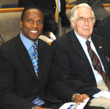 Football legend Willie Gault (l) and NLM director Dr. Donald Lindberg prepare for a panel discussion on the importance of educating the public, and athletes in particular, about the risks of heart disease.