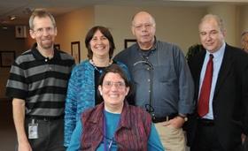 Recent retiree Mary LaMarca (c) is joined by (from l) Dr. Eric Green, Dr. Ellen Sidransky, LaMarca’s husband George Stephens and Dr. Edward Ginns, NINDS