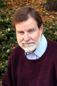 Wilson, shown here outside the Institute’s main building, noted that NIEHS is especially well positioned to lead NIH climate change efforts. “NIEHS works on the front end of disease by studying environmental triggers of disease,” he told participants.