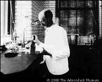 Edward L. Trudeau in his laboratory