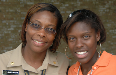 Lcdr. Alison Adams-McLean (l), a registered nurse in the Commissioned Corps, with potential recruit