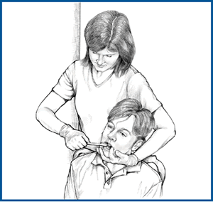 Illustration of a caregiver standing behind a person in a wheelchair brushing the person's teeth.