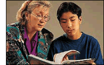 parent and child reading a book together