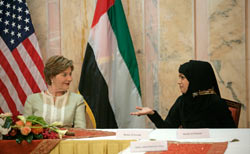Mrs. Laura Bush talks with Basmah Seyoudi during a roundtable discussion with young Arab women leaders in Abu Dhabi.