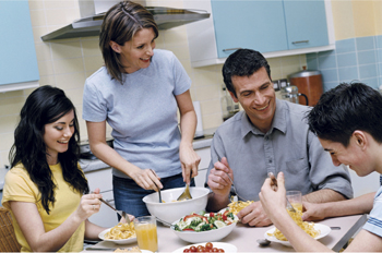 A family talking during dinner