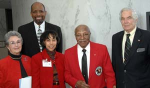 Attending the NLM African- American History Month exhibition opening were (from l) Mary Lindberg, wife of NLM director Dr. Donald Lindberg; NLM Education and Outreach Liaison David Nash; Barnett Memorial Exhibit creator Dr. Patrice Yarbough; special guest Charles Flowers; and NLM director Lindberg.