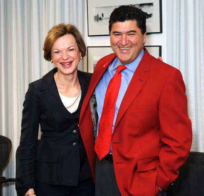 Dr. Elizabeth Nabel, NHLBI director and NIH vice-chair for the 2007 CFC campaign, presents NIH director and NIH CFC chair Dr. Elias Zerhouni with the red blazer he agreed to wear for 2 weeks in February (American Heart Health Month) when NIH successfully surpassed its goal and raised more than $2.2 million for CFC charities, setting a new NIH record.