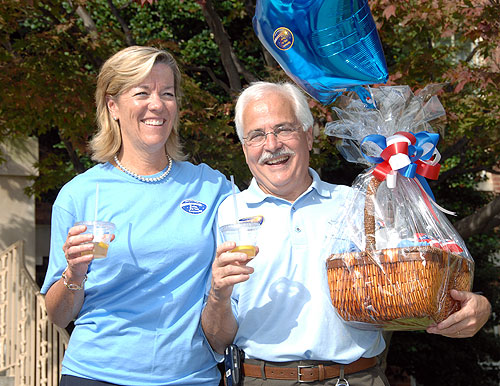 NCI's Kathy McBrien and Larry Ray enjoy refreshments