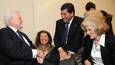 Chatting with Shriver (r) at the event are (from l) her brother Sen. Edward Kennedy (D-MA), Dr. Nadia Zerhouni and her husband, NIH director Dr. Elias Zerhouni.