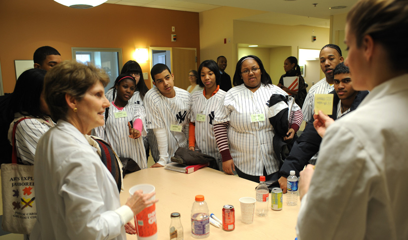 Clinical Center nutrition department dietitians quiz the kids on sugar in soda.