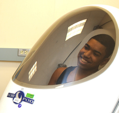 Jairo Sanchez-Chavez chills in the Bod Pod, which measures percent fat and lean.