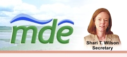 Photo of MDE website logo with Secretary Shari Wilson to the right 