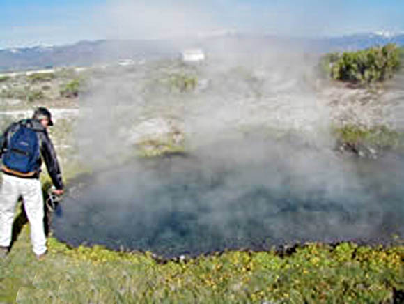 Sampling thermal water at a hot spring in Surprise Valley, Nevada.