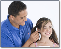 Parent protecting kids hearing