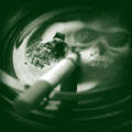 Image of a cigarette and death