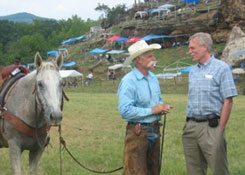 Congressman Snyder talking to Dan Eoff at the Chuckwagon races.