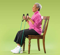 Photo of woman doing arm curl with resistance band exercise