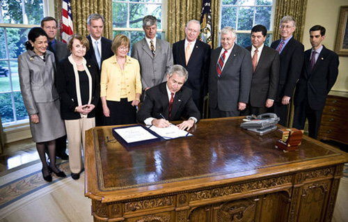 President Bush Signs H.R. 493