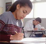 girl writing at her desk